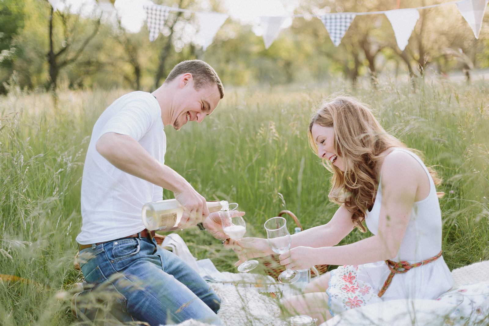 couple having fun at their engagement session